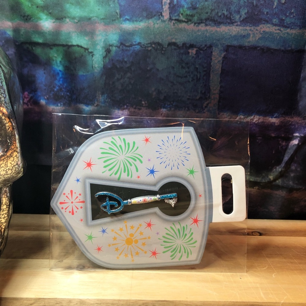 Disney celebration key pin NWT